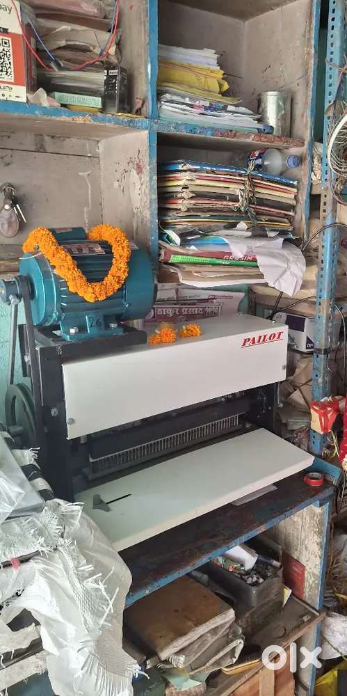 Spiral notebook machine