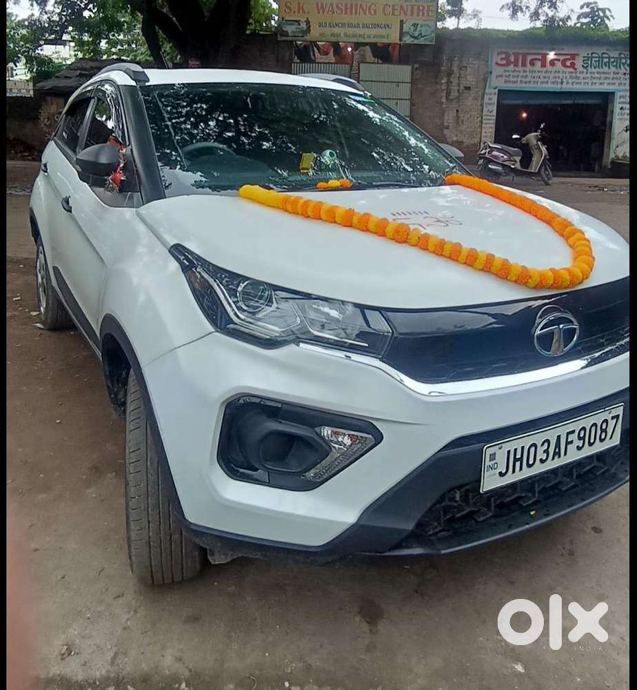 Nexon White Colour With Sunroof In Well Maintained