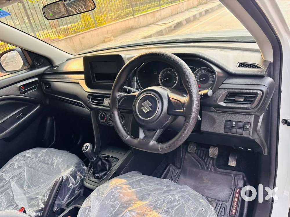 Maruti Suzuki Brezza 1.5 Lxi Smart Hybrid, 2025, Petrol