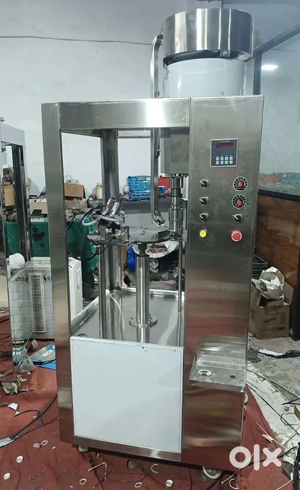 LIQUID FILLING MACHINE,FILLING MACHINE,STICKER LABLING MACHINE,RO PLAN