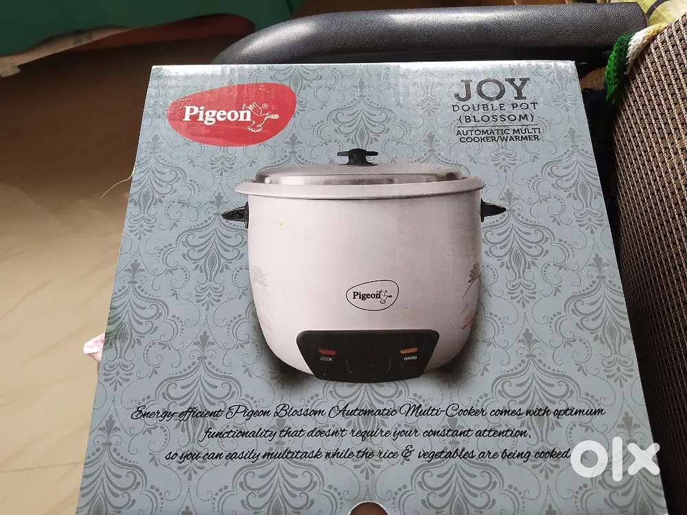 New         Electric cooker.