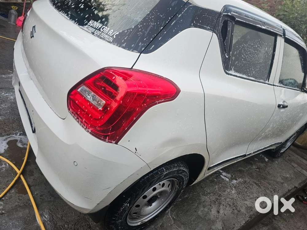 Swift , 2022, Petrol , White Color , 23200km Driven ,