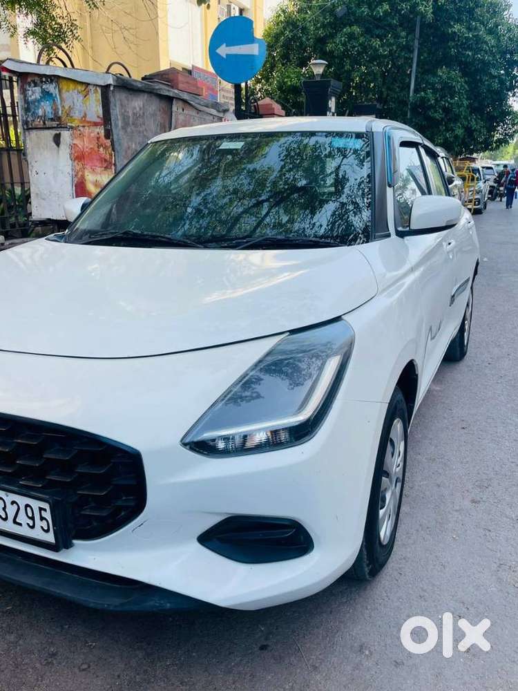 Maruti Suzuki Swift 1.2 Vxi (o), 2024, Petrol