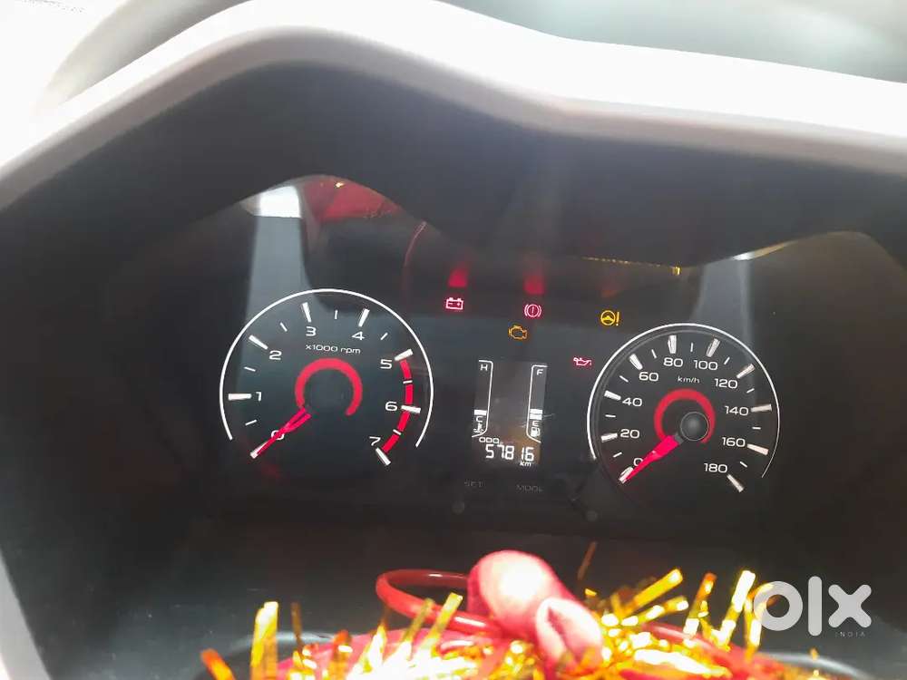 Mahindra Kuv 100 2016 Petrol Good Condition & Top End Model