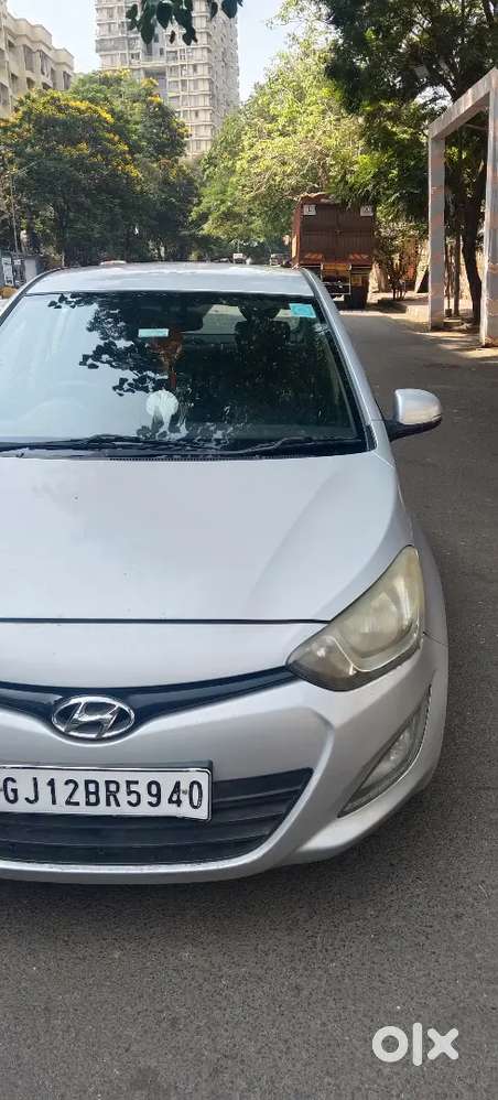 I20, 2nd Owner, Gujrat Registration, Petrol, Sportz ,silver Color,.