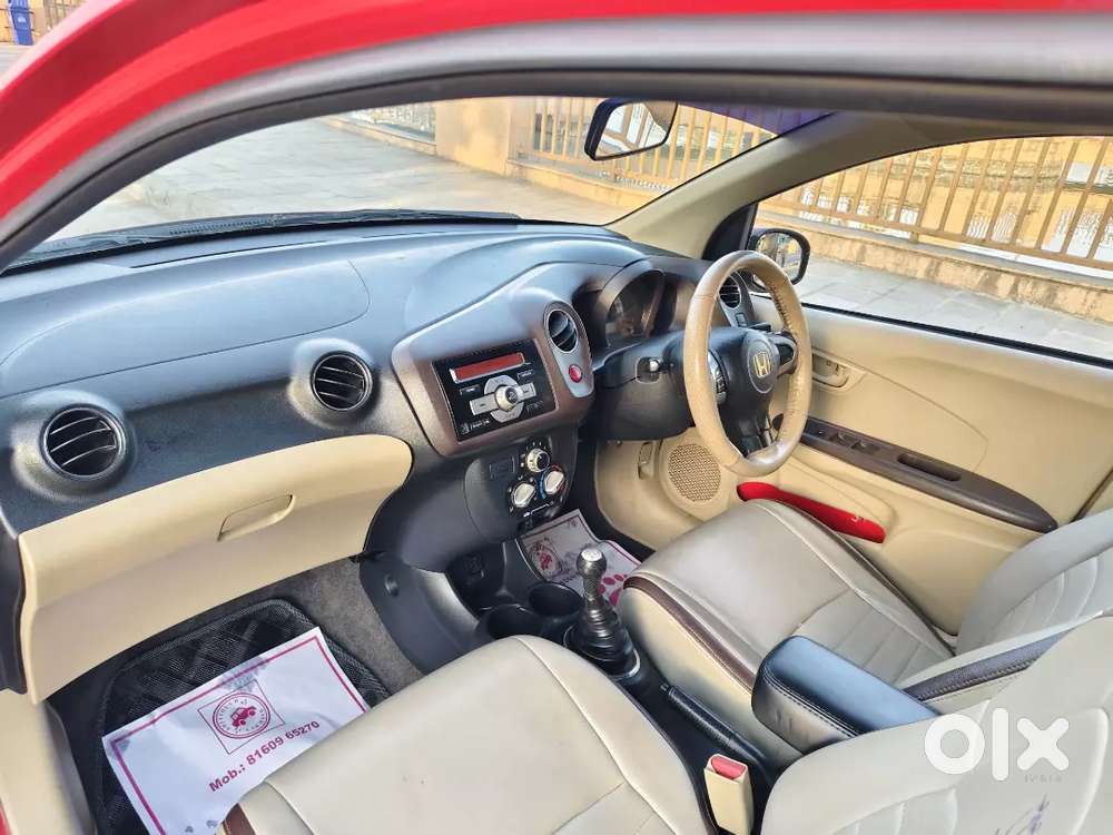 Honda Brio Sporty Look 
 Magwiil Spot Tire Center Lock