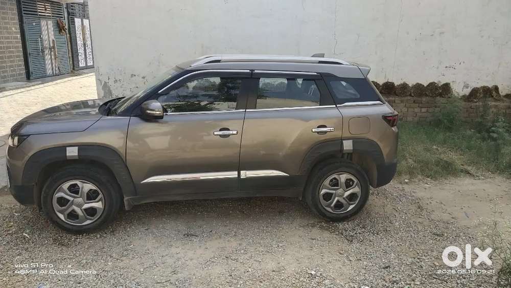 Maruti Suzuki New Brezza 2023. My Car Insurance Feb. 2027.