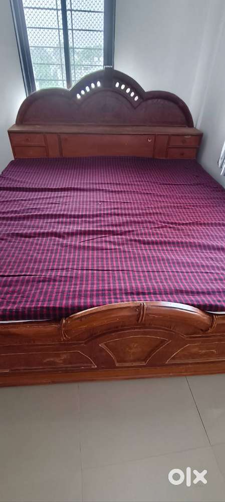 Selling a solid wooden King Size Double Bed complete with comfortable
