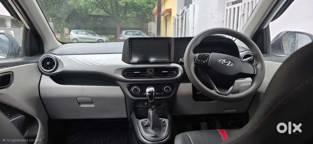 Hyundai Grand I10 Nios 
Sports Variant
Colour White/black
Cg 04 Passin