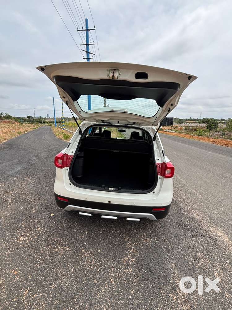 2021 Vitara Brezza Zxi (white)  1st Owner  38k Km  Mint