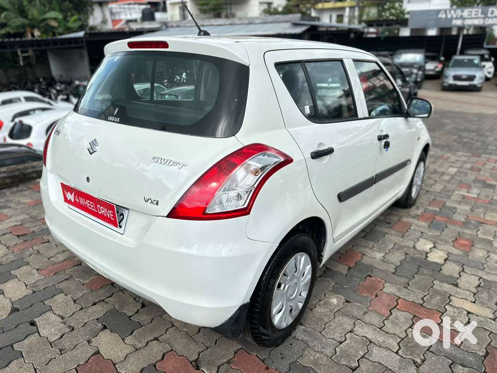 Maruti Suzuki Swift Lxi Optional-o, 2013