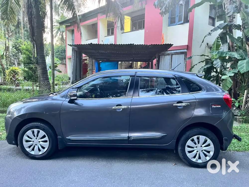 Maruti Suzuki Baleno With All 4 New Tyre And Seat Cover