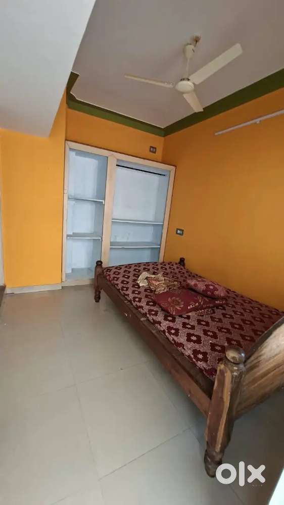 1 room with bed cot and fan is for rent