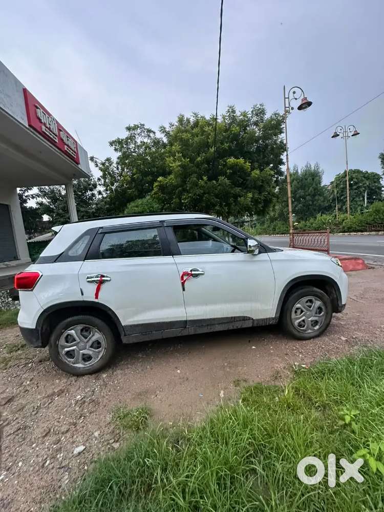 Maruti Suzuki Vitara Brezza 2021 Petrol 68000 Km Driven 18 Average