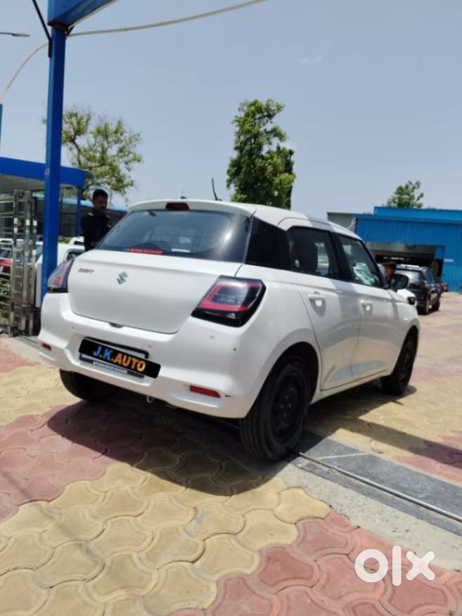 Maruti Suzuki Swift 1.2 Vxi (o), 2024, Petrol