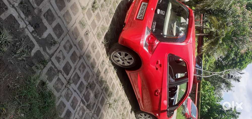 Honda Brio . Vx Mt . 9 Yrs . 12000 Km Driven.
