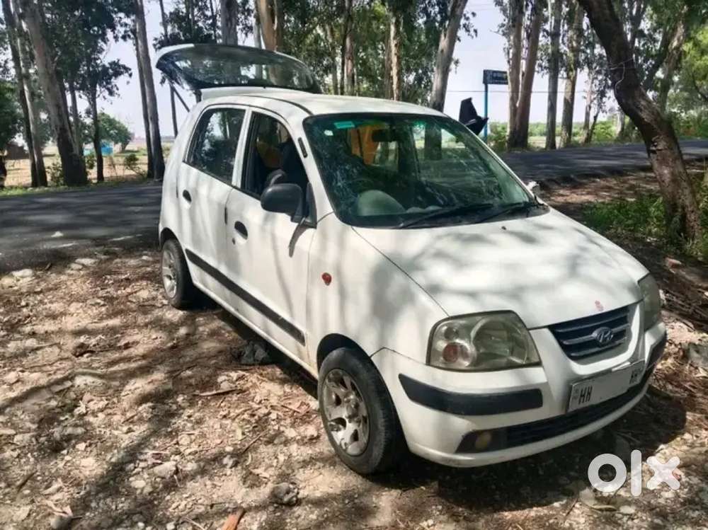 Top Modal Santro Xing Gls 2009 Petrol