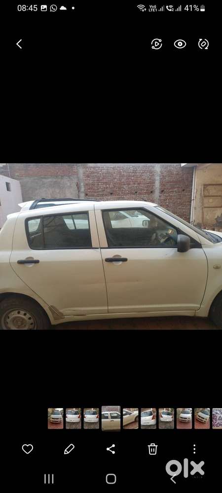 Maruti Swift Lxi Petrol White 2009