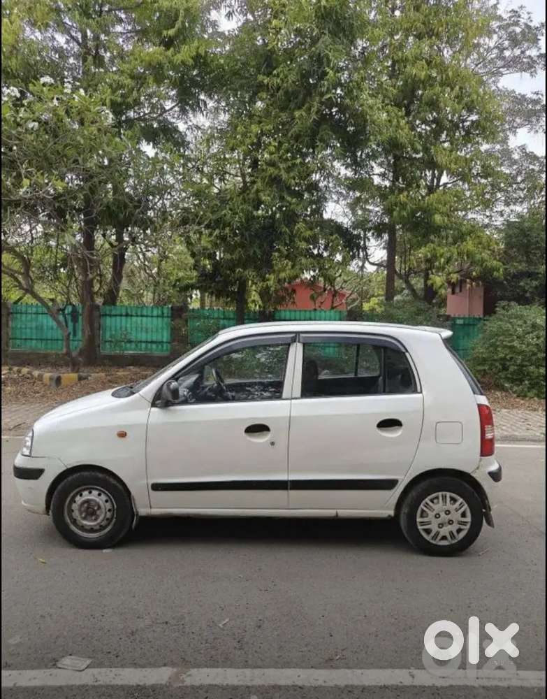 Cng Hyundai Santro Xing 2013 Petrol 85000 Km Driven Cng .and Child Ac