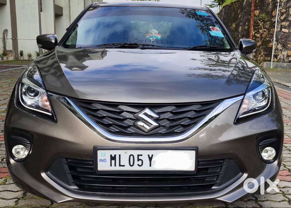 Baleno Showroom Condition Only 20000 Km Running Fully Loaded.