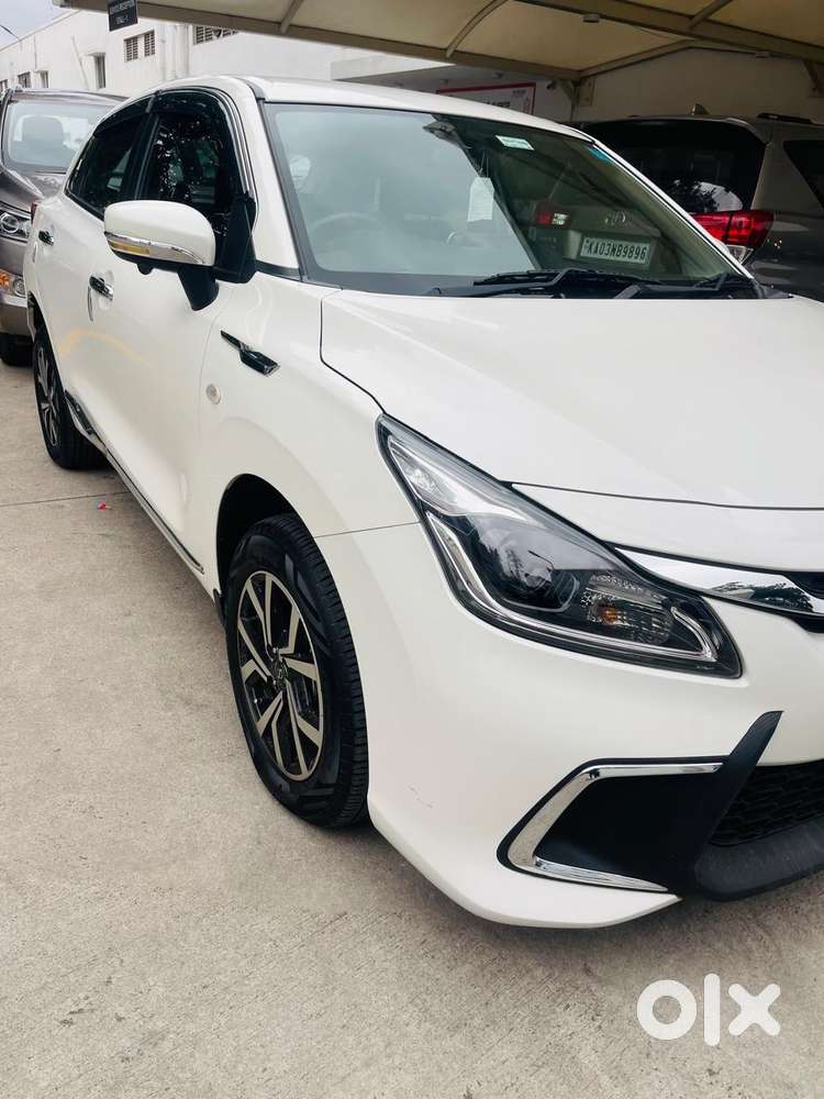 Toyota Glanza Cream White, Brand New Condition, Used Very Less.