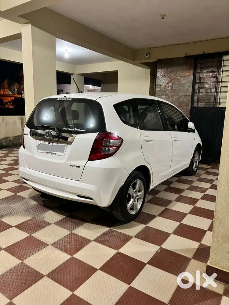 White Car With Showroom Record