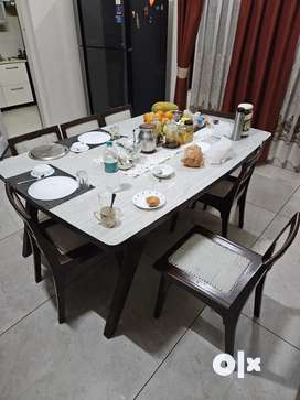 8 seater deals dining table olx