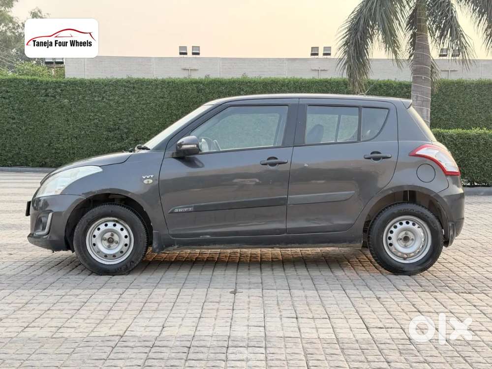Maruti Suzuki Swift Lxi Optional-o, 2015, Petrol