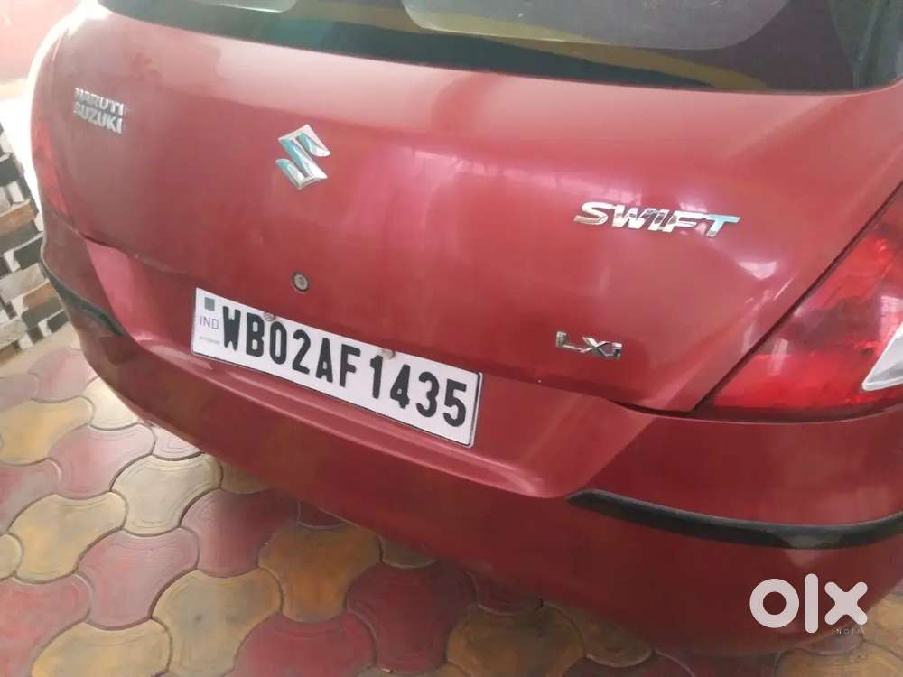 Maruti Suzuki Swift Lxi 2014