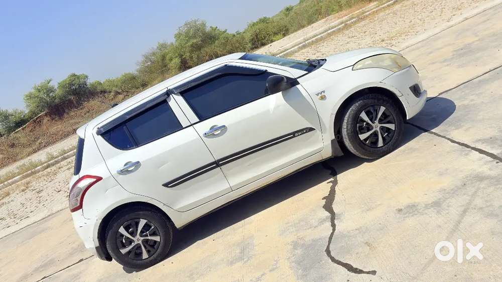 Maruti Suzuki Swift Lxi 2011