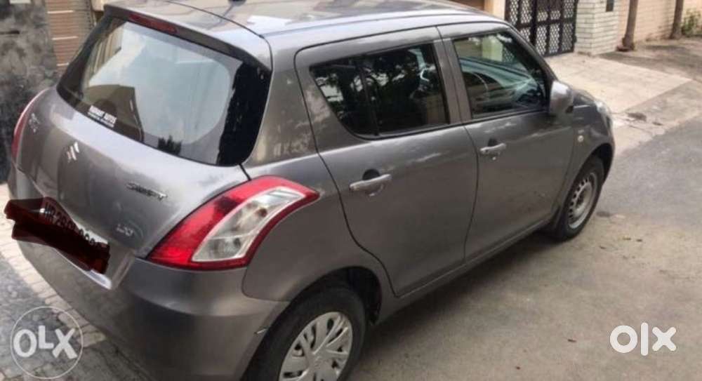 Swift Lxi 2015 Km Driven