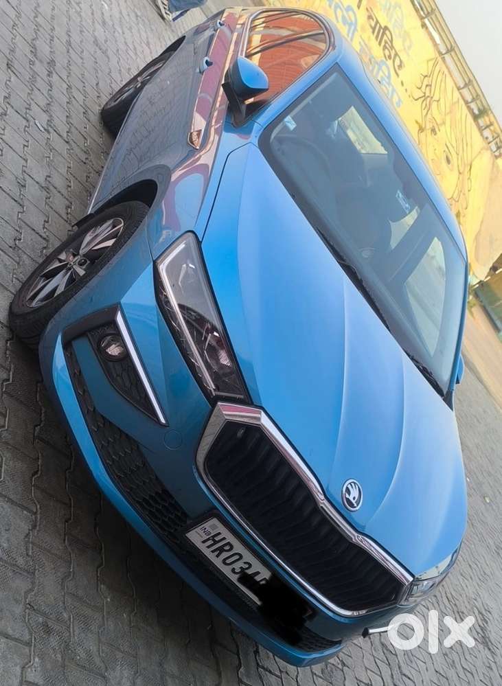 Crystal Blue Skoda Slavia Petrol 2024