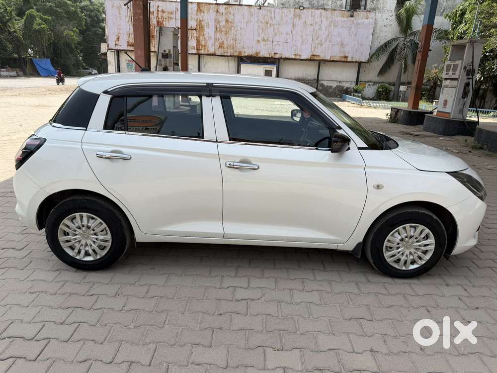Maruti Suzuki Swift Lxi Optional-o, 2024, Petrol