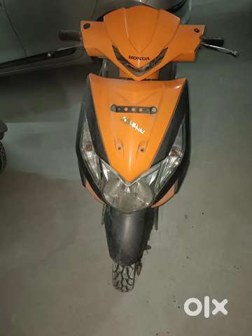 Honda dio orange price hot sale