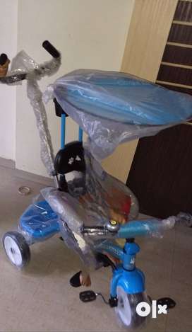 Baby tricycle olx 2025
