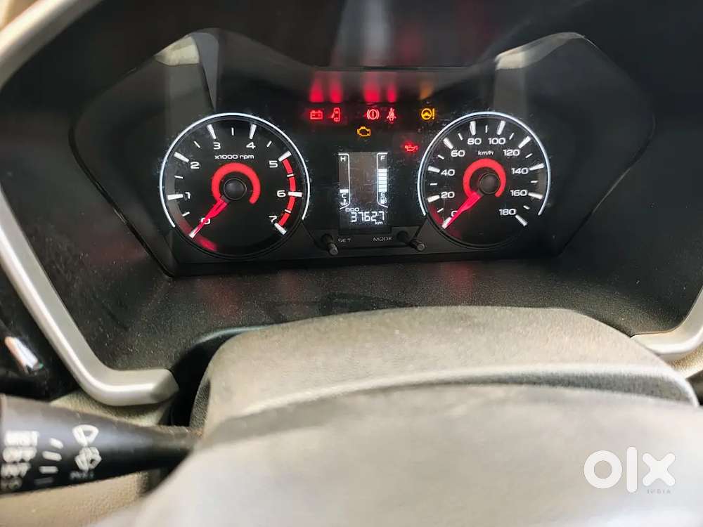 Well Maintained Kuv 100 Very Less Driven.