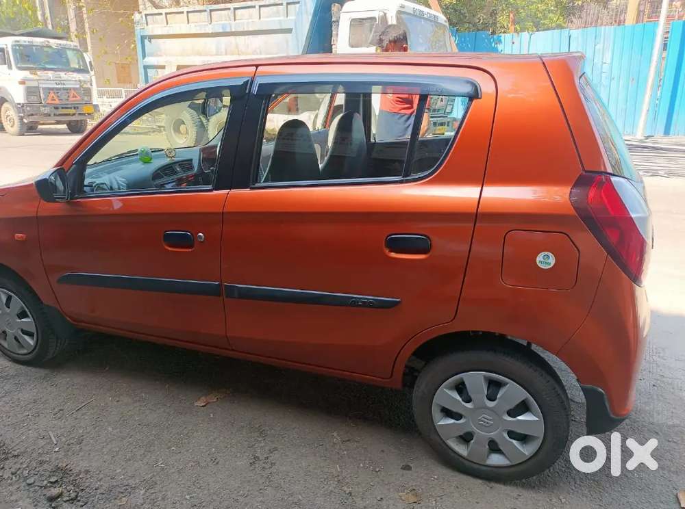 Maruti Suzuki Alto K10 2016 Orange Colour In A Good Condition.