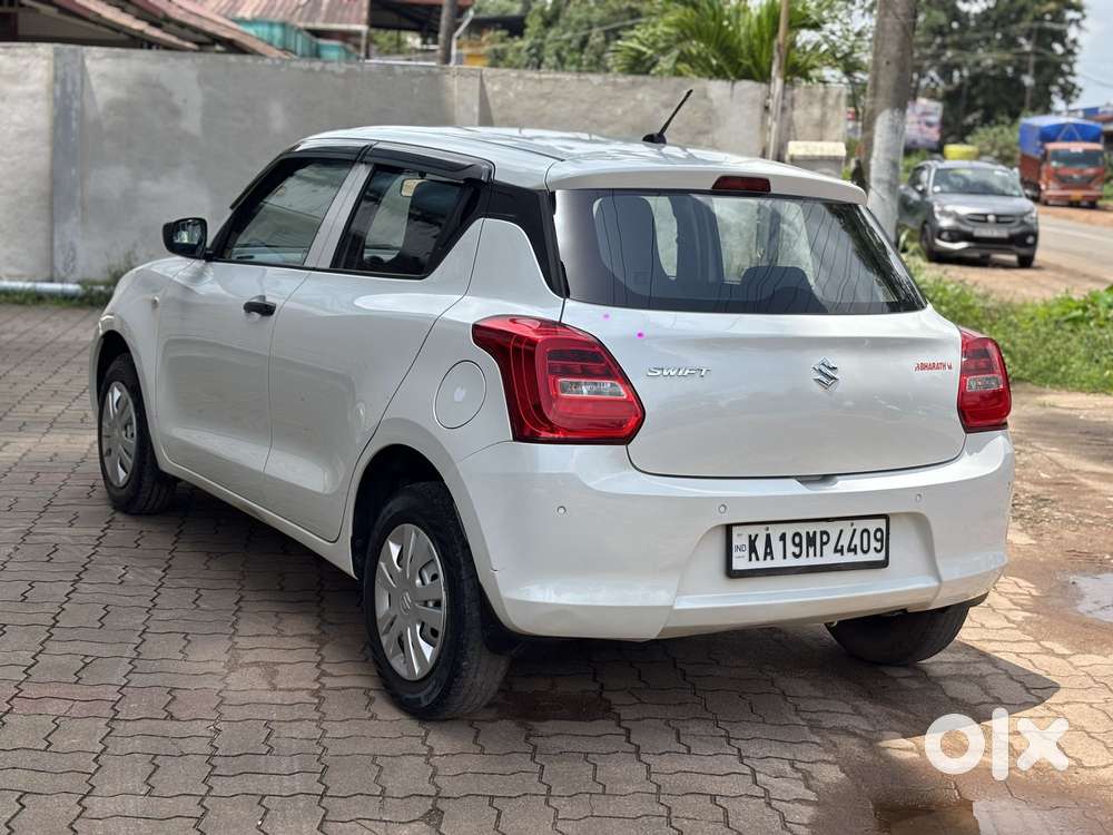 Maruti Suzuki Swift 1.2 Lxi (o), 2024, Petrol