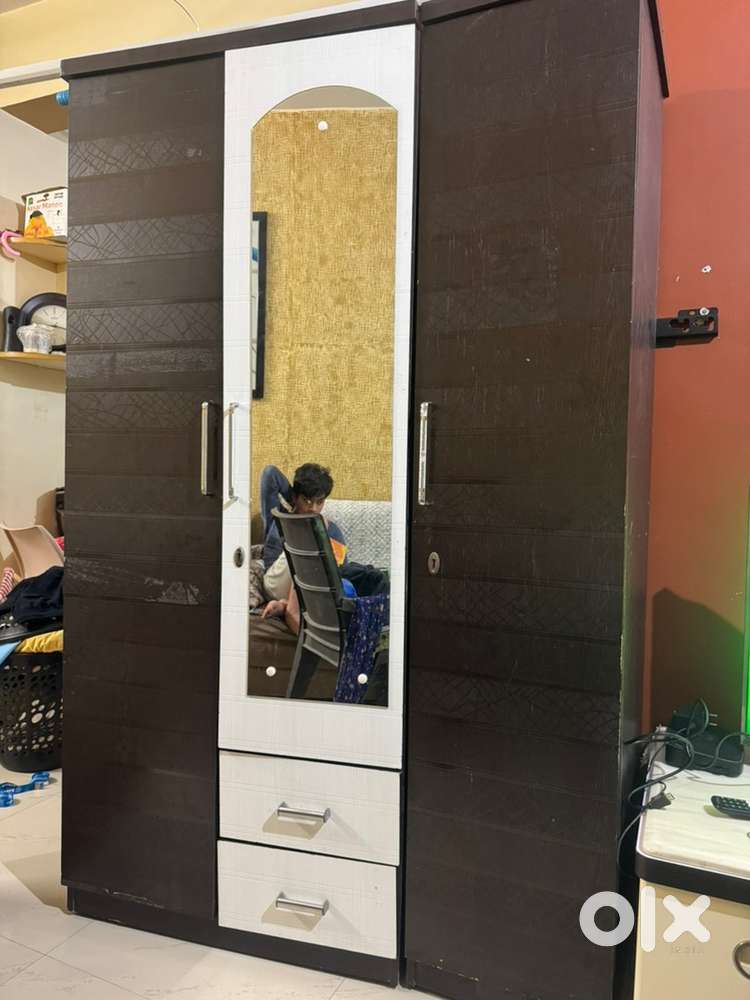 3 door with mirror cupboard and center table