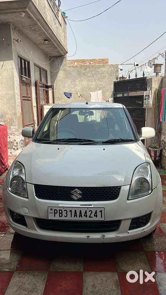 Swift 2011 Maruti Lxi