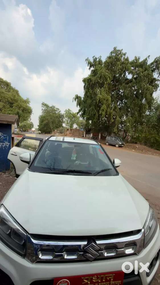Maruti Brezza Lxi 2020 Model  Drive 80000 Km