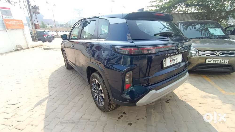 Maruti Suzuki Grand Vitara 1.5 Zeta Plus Dual Tone Intelligent Hybri..