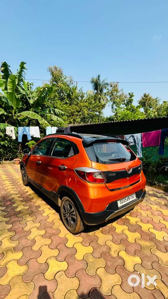 Tata Tiago Nrg Manual Petrol &ndash; Orange Colour &ndash; 66,647 Km Driven