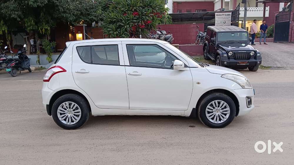 Maruti Suzuki Swift Lxi Optional-o, 2015, Petrol