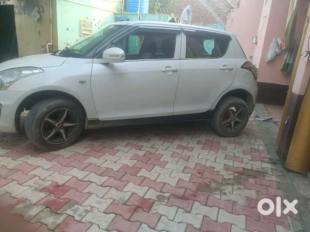 Maruti Suzuki Swift Lxi 2016
