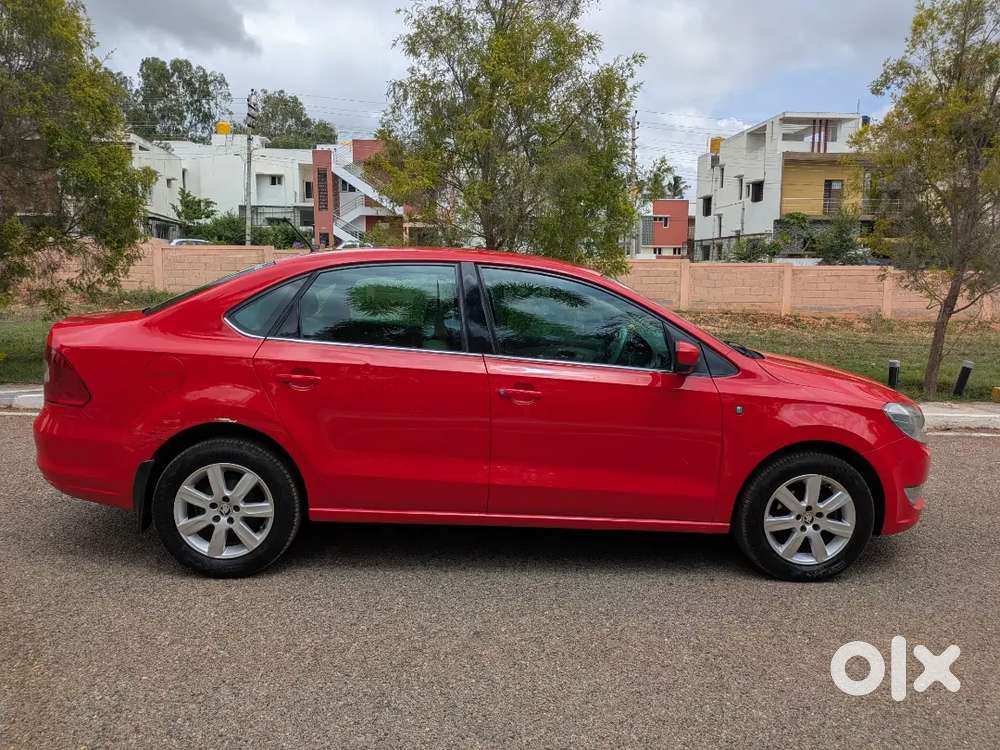 Skoda Rapid 2014 ,red Colour ,diesel Well Maintained