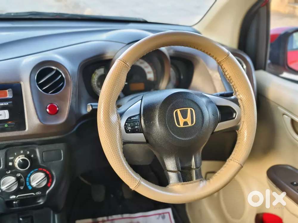 Honda Brio Sporty Look 
 Magwiil Spot Tire Center Lock