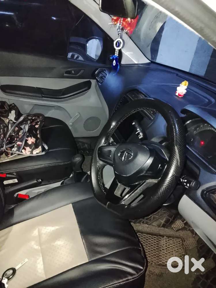 2023 October Tata Tata Tiago Xe (petrol) - White  21,000 Km
