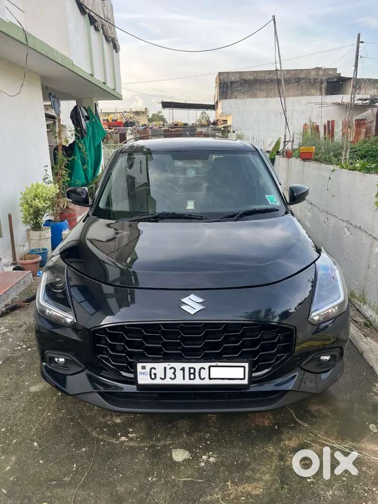 Maruti Suzuki Swift Black Vxi 2026