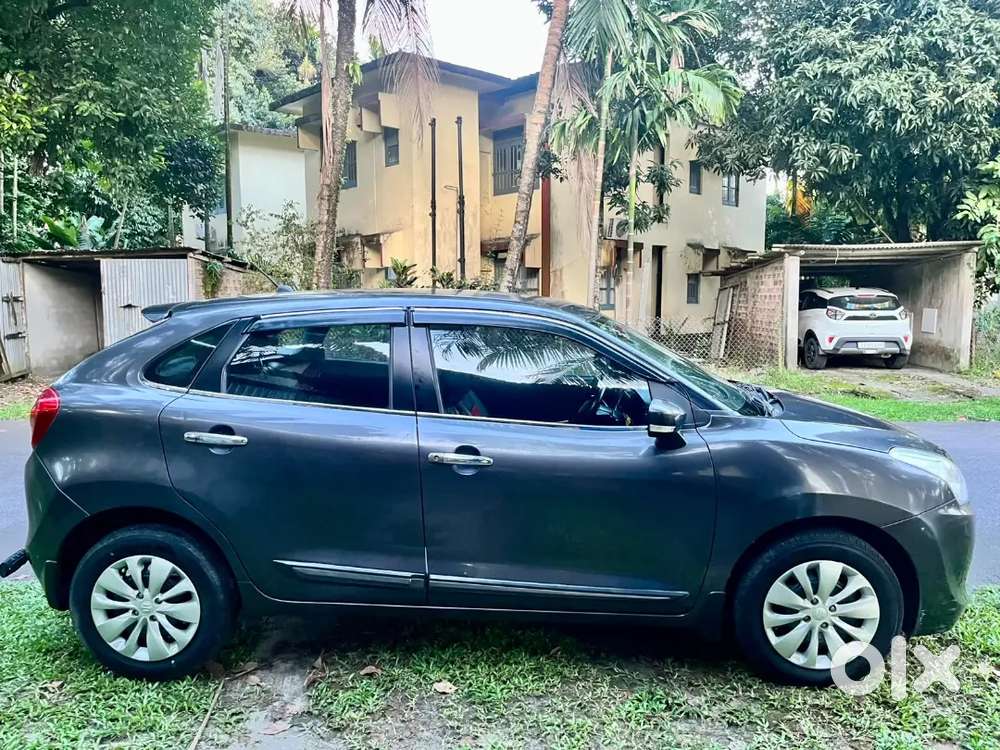 Maruti Suzuki Baleno With All 4 New Tyre And Seat Cover